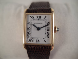 Cartier Tank 18 k solid gold, manual winding, gp Cartier buckle, 17 x 20 mm ca 1965