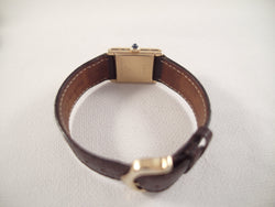 Cartier Tank 18 k solid gold, manual winding, gp Cartier buckle, 17 x 20 mm ca 1965