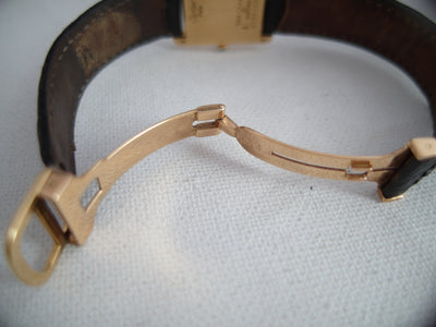Cartier Tank (papers) 18 K gold folding clasp 1978 31x24 mm unisex quartz solid gold