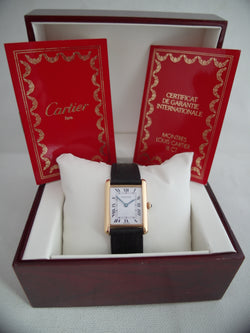 Cartier Tank (papers) 18 K gold folding clasp 1978 31x24 mm unisex quartz solid gold