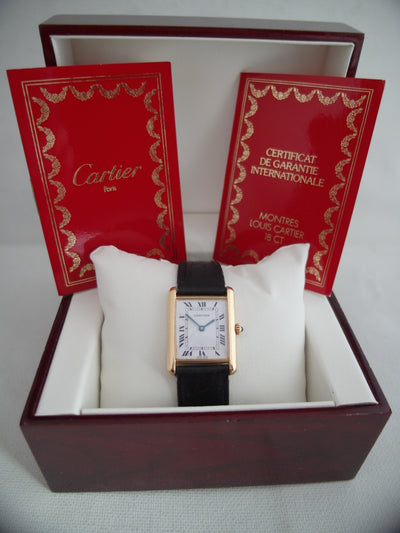 Cartier Tank (papers) 18 K gold folding clasp 1978 31x24 mm unisex quartz solid gold