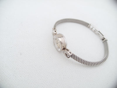 Omega Sapphette solid 14k white gold 10 diamonds bracelet