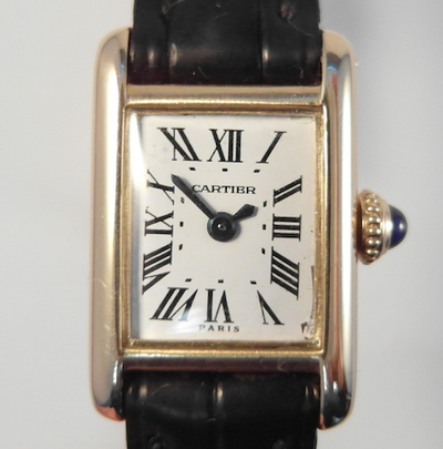 Cartier Tank solid 18k case, 18 k fold clasp, Cartier strap, vintage 1960